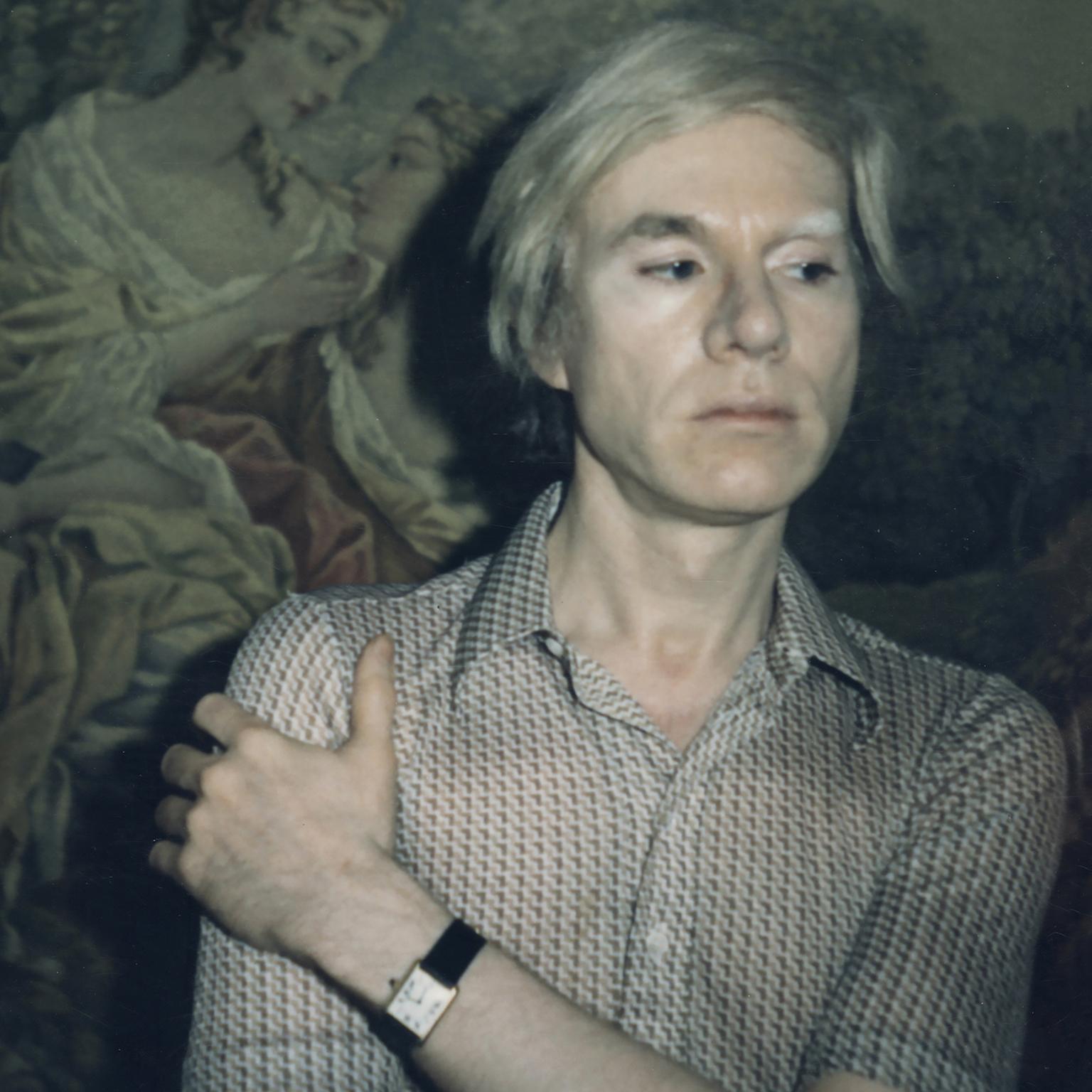 Andy Warhol in his Cartier Tank watch