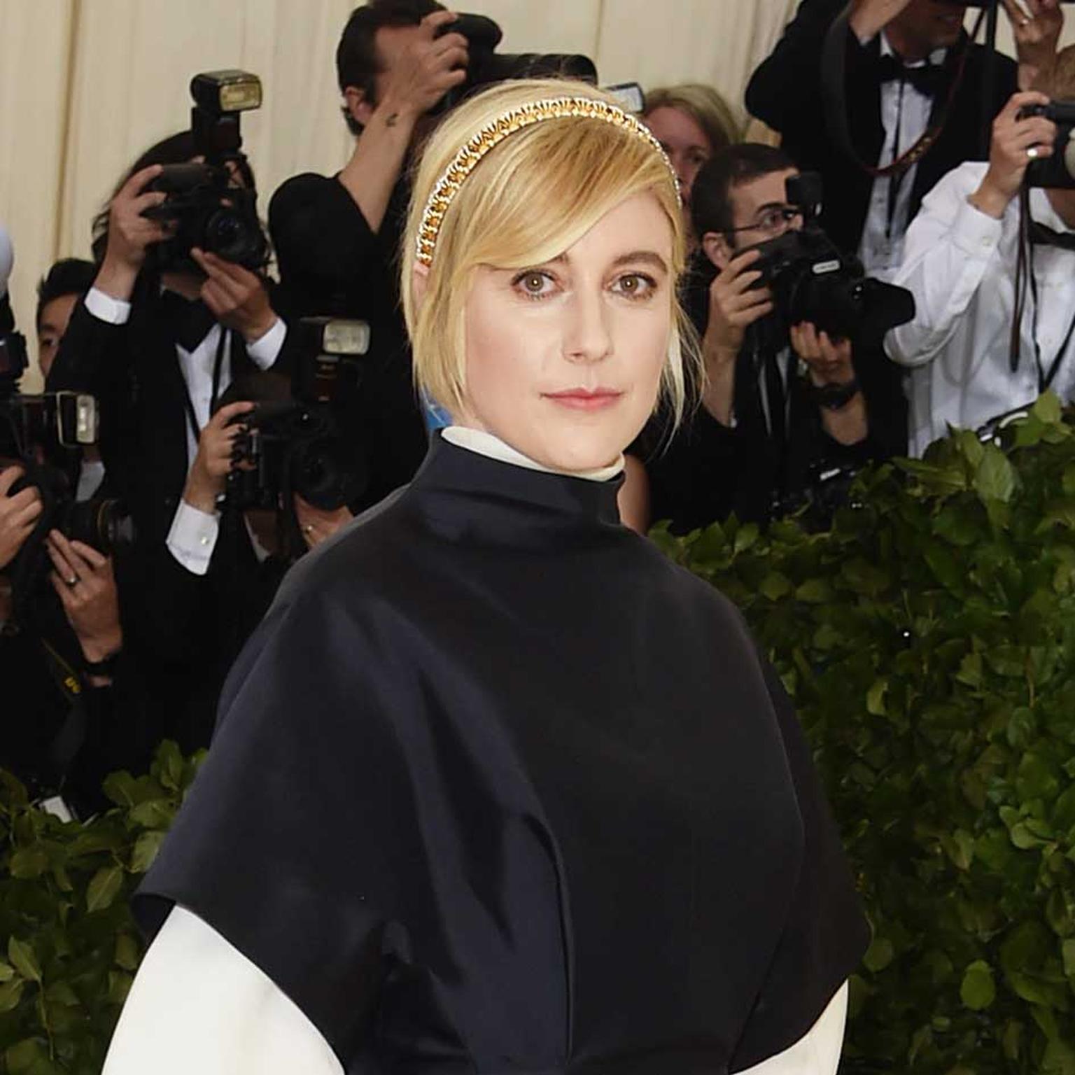 Greta Gerwig at the Met Gala 2018 Tiffany Hands necklace worn on head designed by Jean Schlumberger