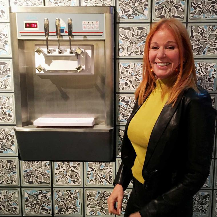 Suzanne Syz beside her Frozen Yogurt machine at PAD London