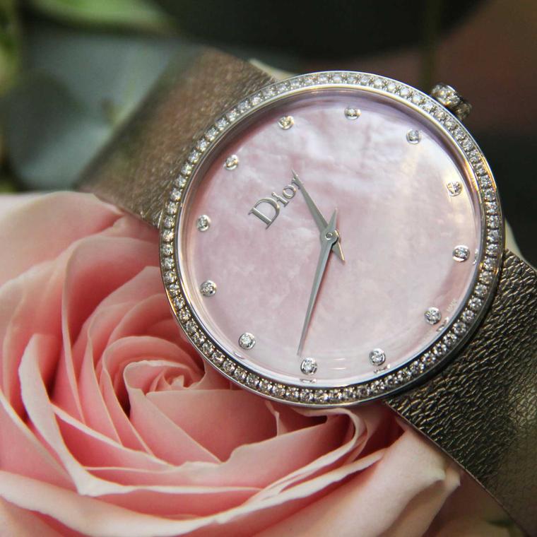 La D de Dior Satine watch with a pink mother-of-pearl dial