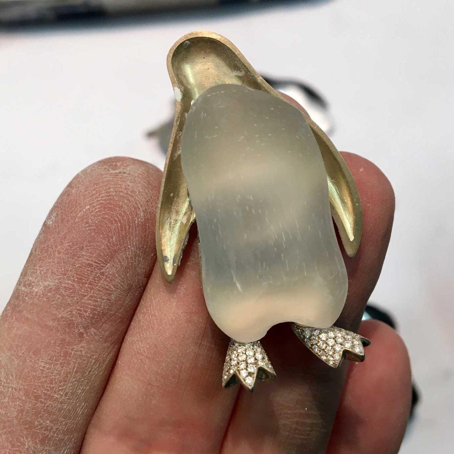 In the Vhernier stone cutting workshop in Valenza where the different layers of stone and rock crystal are cut to create the bright colours of the trasparenza jewels such as this Penguin brooch. 