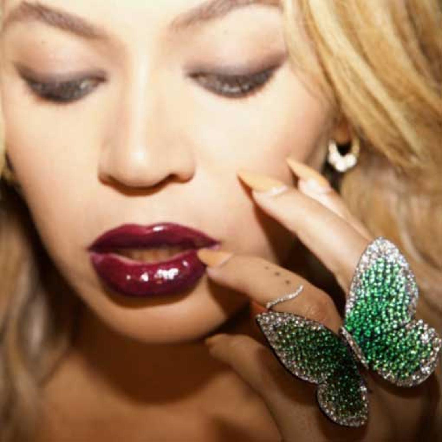 Close up of Beyonce wearing Papillon ring by Glenn Spiro in photo taken by Jay Z