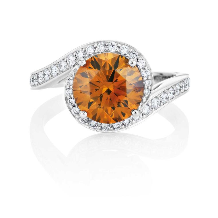 De Beers Caress round brilliant Fancy Deep brown orange diamond ring