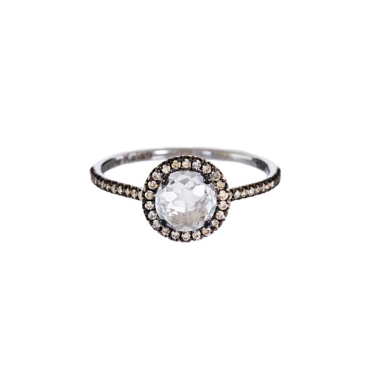 White topaz engagement ring with champagne diamonds