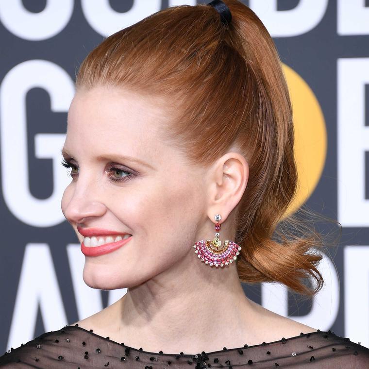 Jessica Chastain in Piaget colourful Limelight Sunny Side of Life earrings Golden Globes 2019