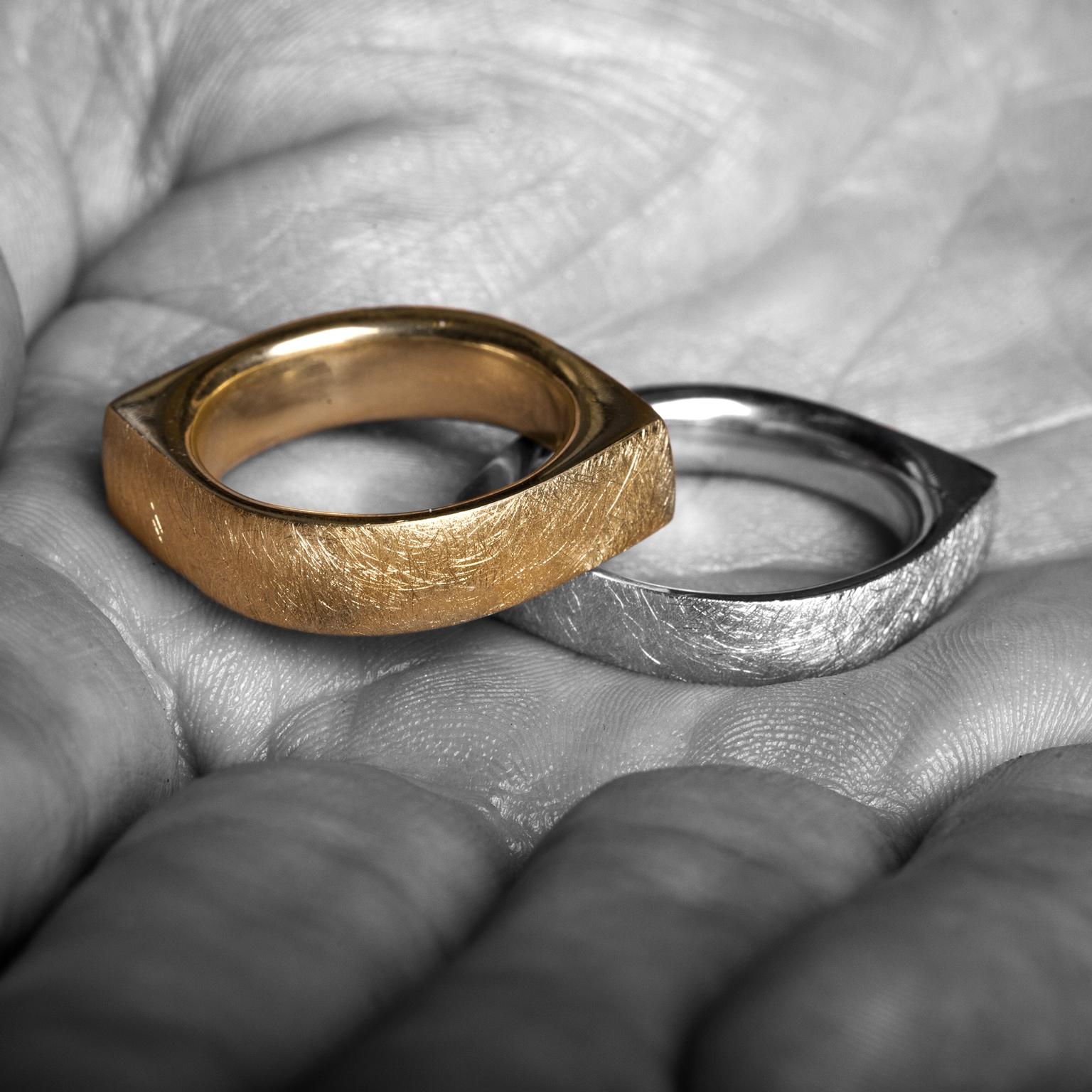 Tawny Phillips gold eye-shaped wedding rings
