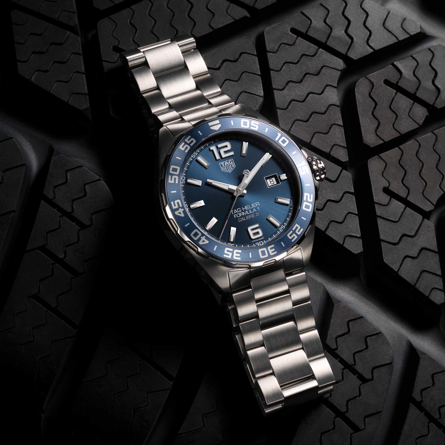 TAG Heuer Formula 1 Bucherer Blue Edition watch on stainless steel bracelet on tyre Price £1650