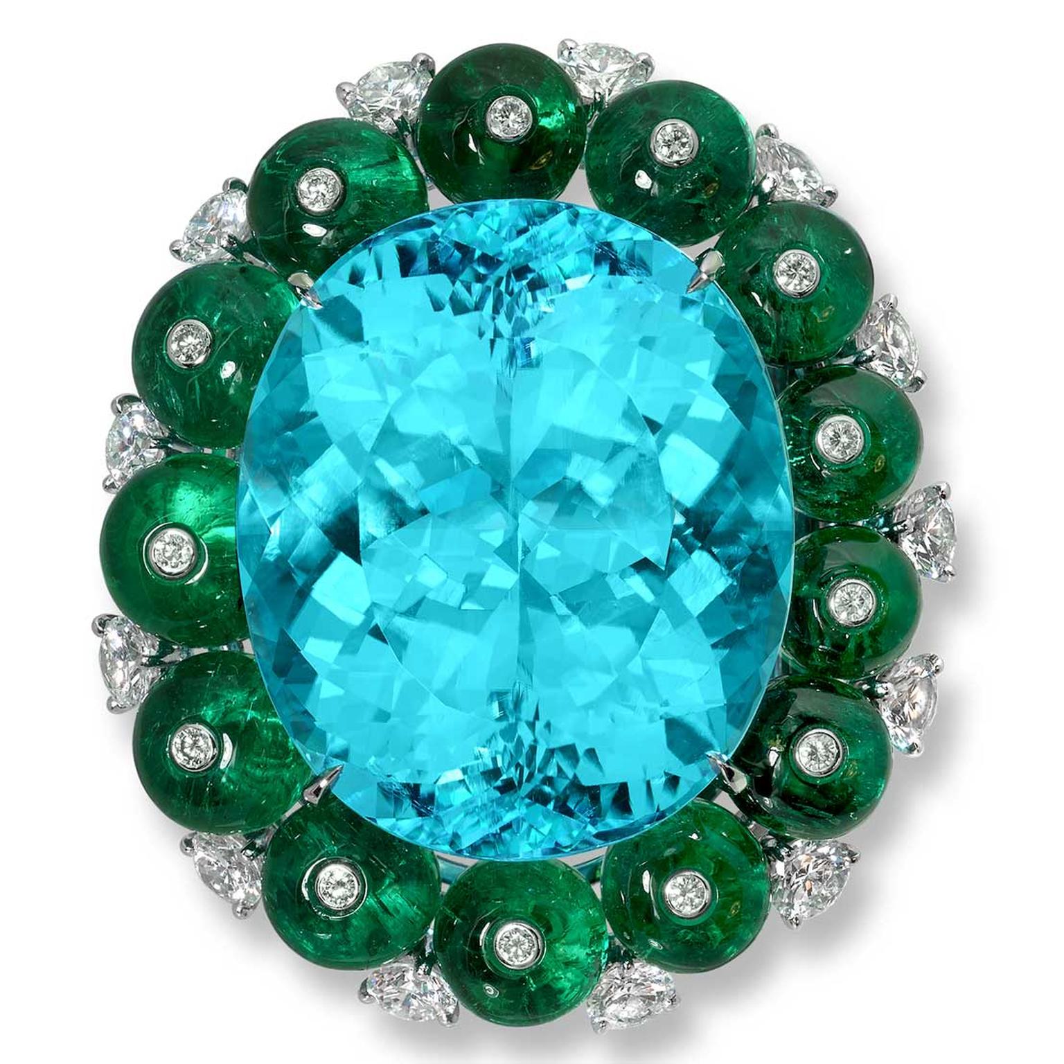 Moussaieff scarf clip with a 57.21ct Paraiba tourmaline 26cts of emeralds and 2.88cts of diamonds set in platinum.