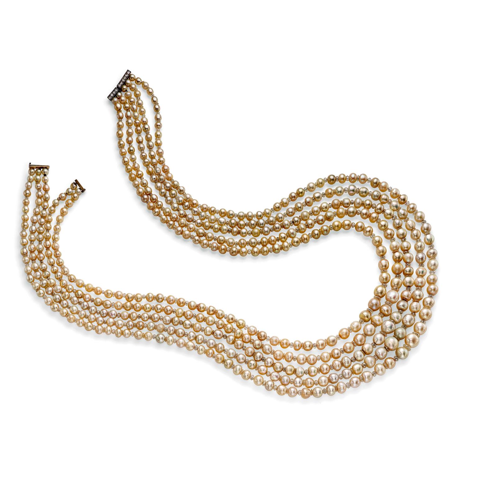 A five-strand natural pearl and diamond necklace