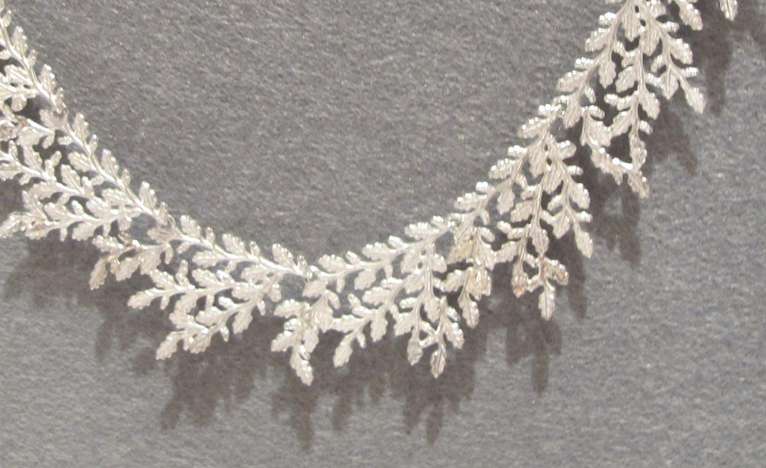 Detail of Beth Gilmour's intricate silver Garland necklace from £525.