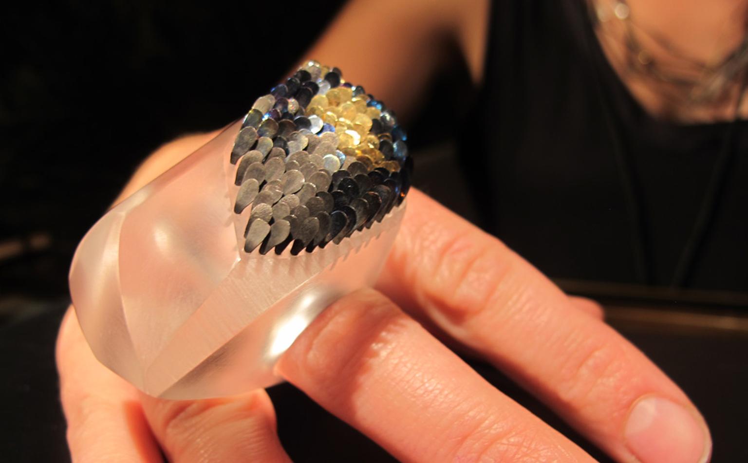 Amazing perspex perspective of Emmeline Hastings ring in gold, titanium and perspex. £780