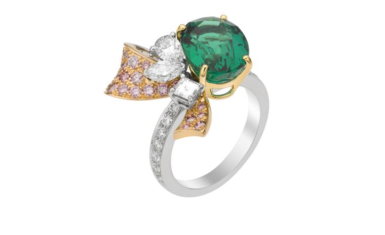 VAN CLEEF & ARPELS. Sonatine ring in platinum, pink gold, oval emerald, round pink diamonds and white diamonds.POA