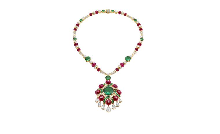 Bulgari. High Jewellery necklace in yellow gold with a Colombian emerald, 9 emeralds, 38 buff top emeralds, 24 spinel beads, 7 pea brilliant cut diamonds, 15 round cut diamonds, baguette diamonds and pave diamonds. POA.