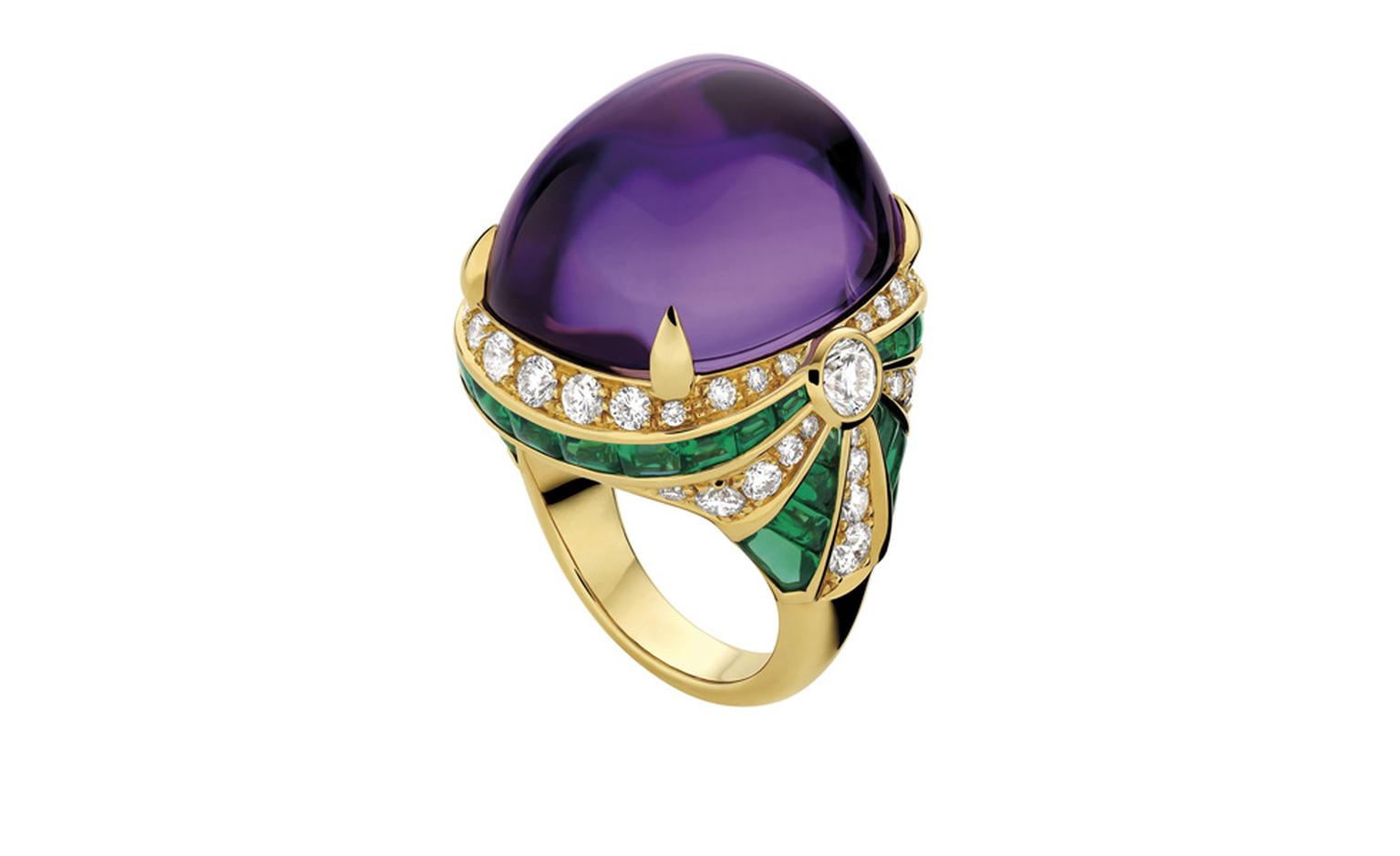 Bulgari. High Jewellery ring in yellow gold with 1 cabochon amethyst, 38 calibrated cabochon emeralds, 2 round brilliant cut diamonds and pave´ diamonds. POA.