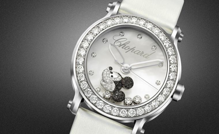 Chopard Happy Mickey watch in stainless steel with diamond set bezel, mother of pearl dial and a mobile Mickey set with black and white diamonds.