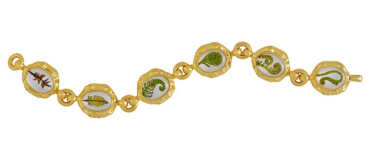 ELIZABETH GAGE, Crystal Fern Bracelet, rock crystal ovals, engraved and hand-painted showing the life cycle of a fern. Set in molten gold surrounds, with polished gold links. £15,000