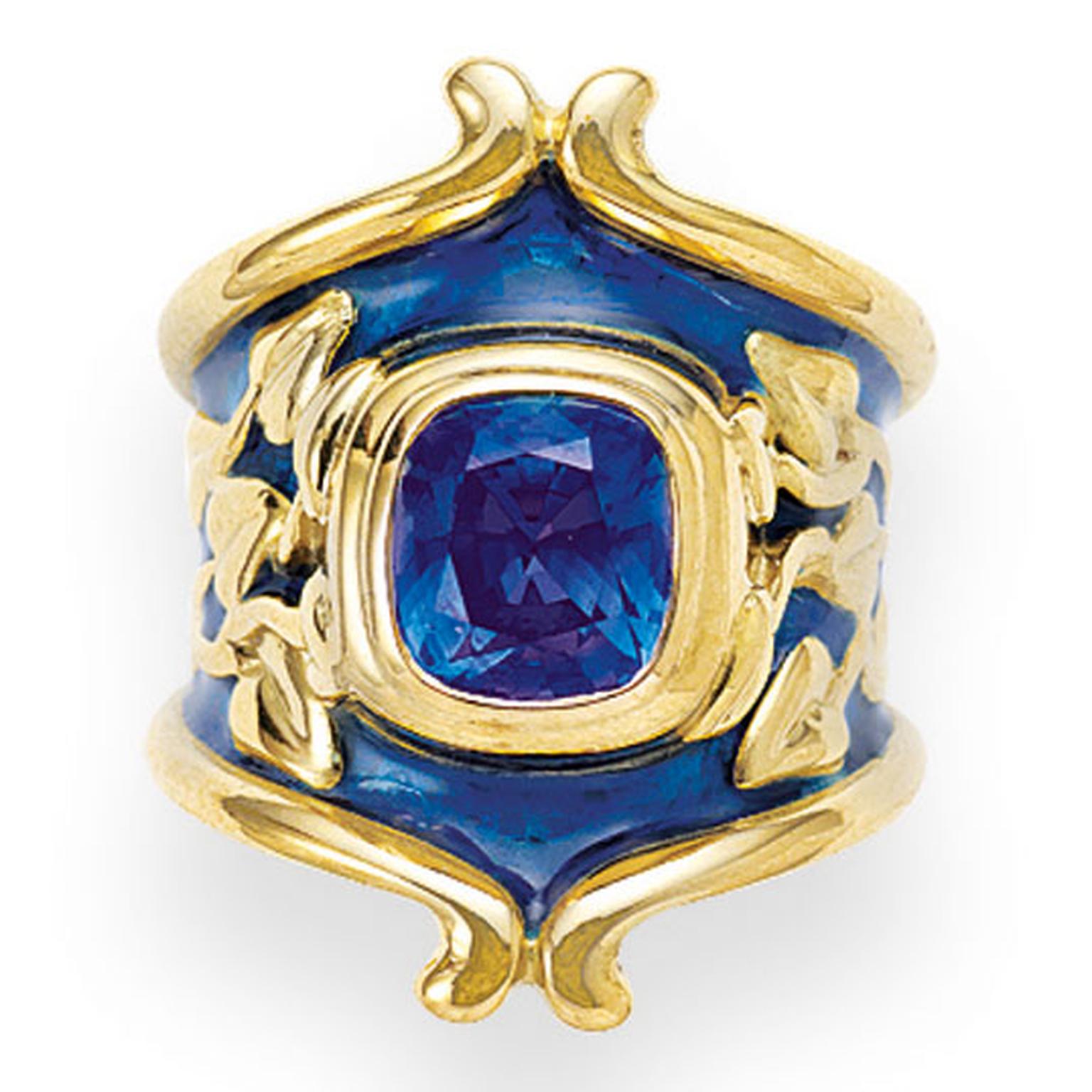 ELIZABETH GAGE, Heliotrope Ring, deep blue sapphire with Royal blue enamel, decorated with carved gold myrtle leaves. £18,600