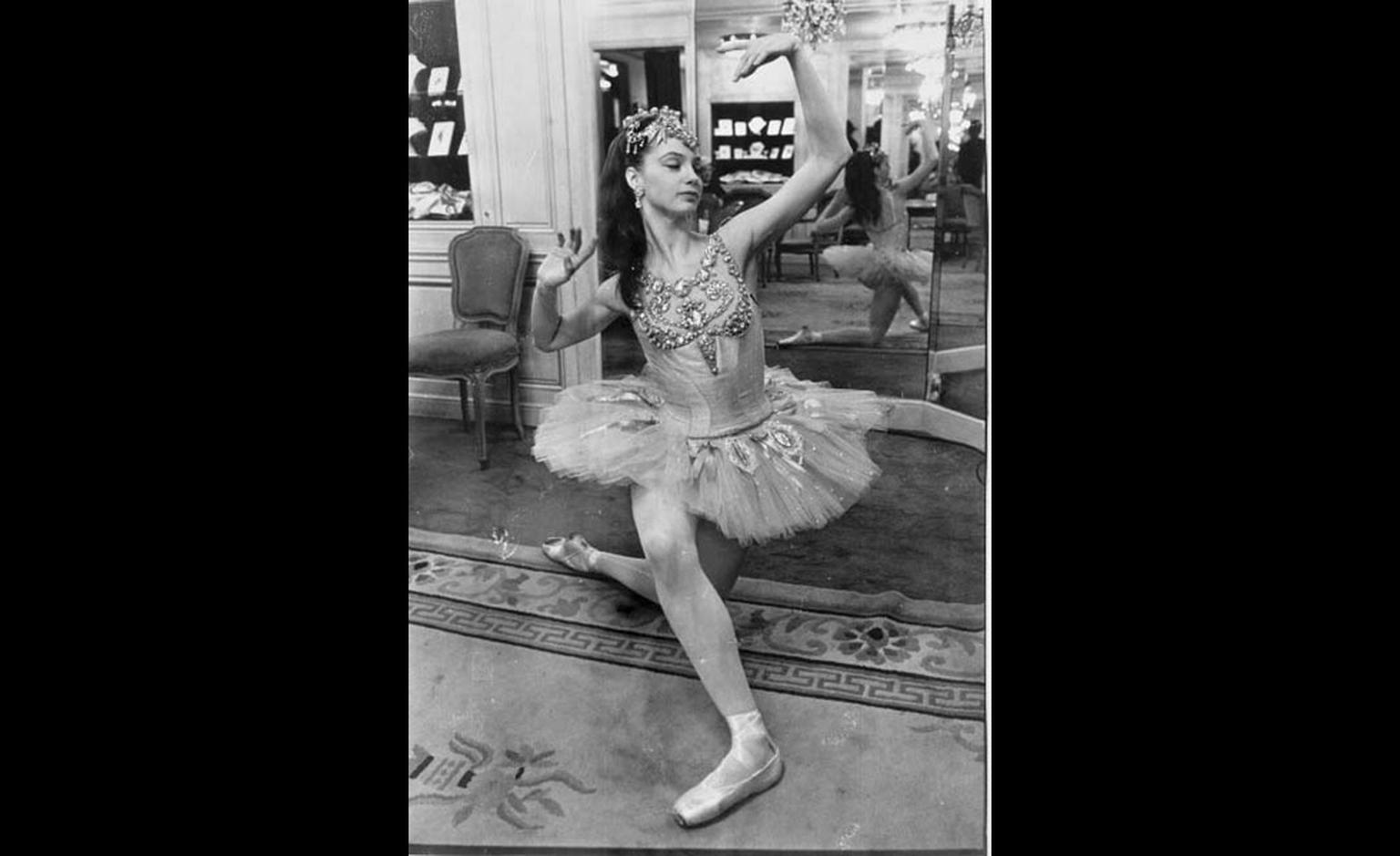 Suzanne Farrell the main dancer in the 'Diamonds'  dance by George Balanchine at Van Cleef & Arpels Place Vendome boutique 1976.