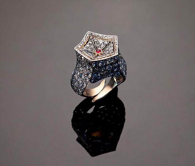 The Star by Eliane Fattal and S.J. Phillips. Once the star is removed in its place a ruby can be mounted in the concave pavé set diamond bezel.