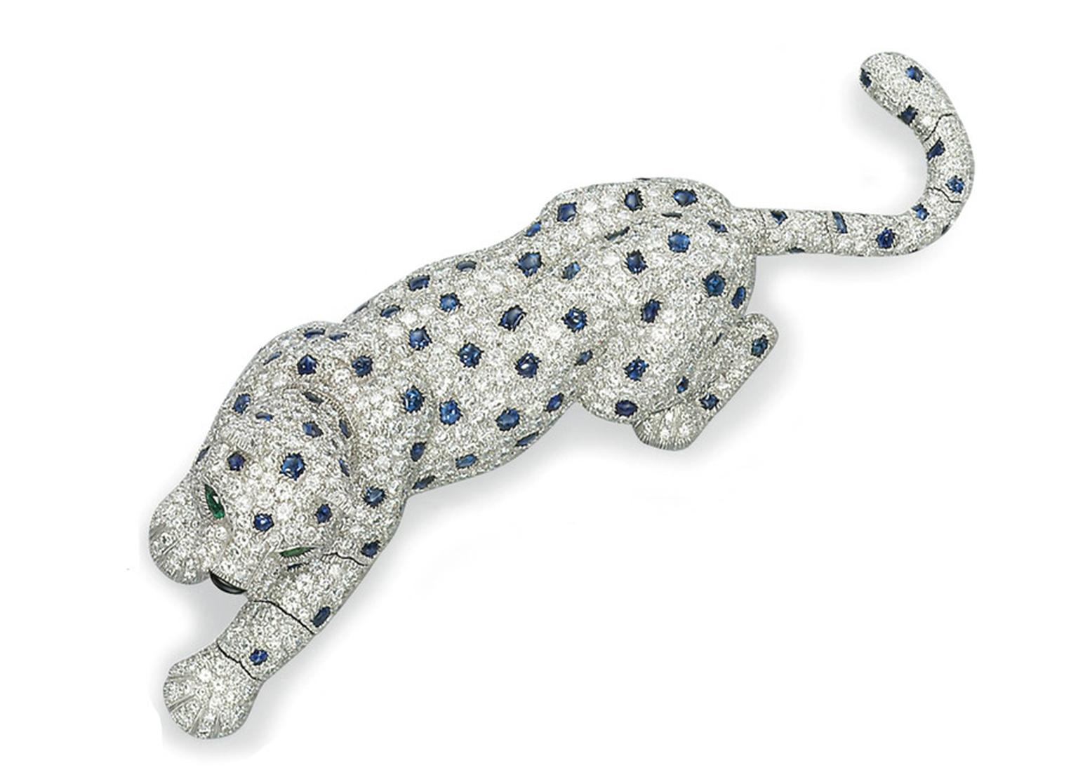 Christies-Lot-361-SAPPHIRE-DIAMOND-EMERALD-AND-ENAMEL-PANTHER-BROOCH-BY-CARTIER.jpg
