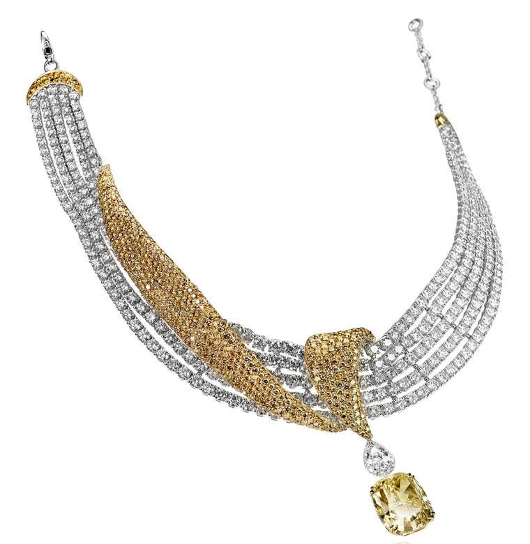 Adler-diamonds-Pendant-in-white-gold-set-with-one-pear-shaped-diamond-and-diamonds._Fancy-Intense-Yellow_-cushion-cut-diamond1BD1