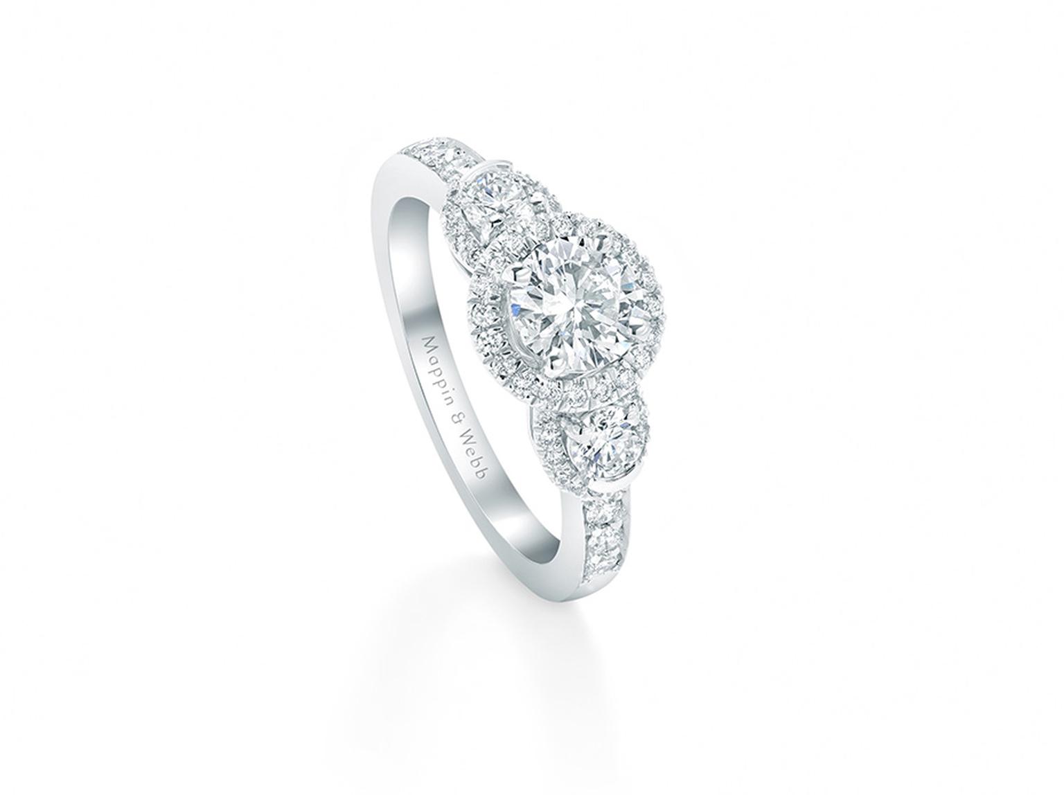 The Eglantine engagement ring from Mappin & Webb's new bridal collection showcases a trio of cushion-cut solitare diamonds