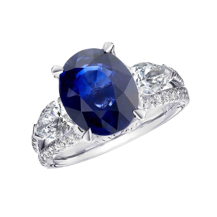 Fabergé Devotion sapphire engagement ring in platinum, set with an oval-cut blue sapphire, two pear-cut diamonds and diamond pavé