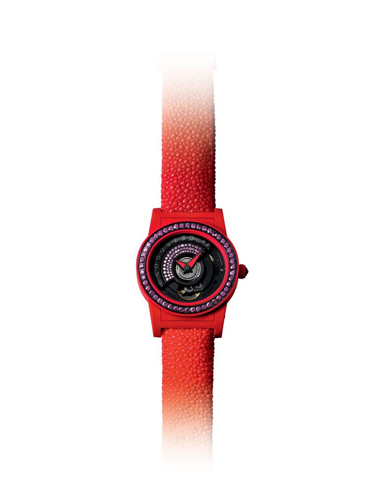 de GRISOGONO's 'Tondo by Night' watch in warm, glowing red.
