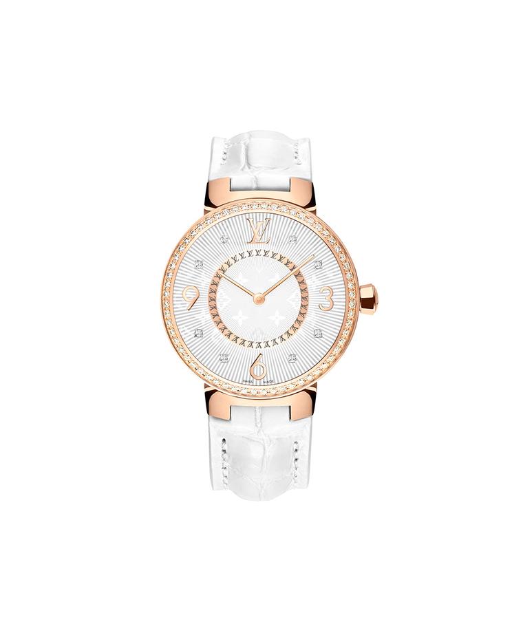 Louis Vuitton Tambour Monogram Or Rose Serti 28mm watch with a pink gold case, diamond-set bezel and a quartz movement on a white alligator strap. © LOUIS VUITTON. Auteur: I REEL.