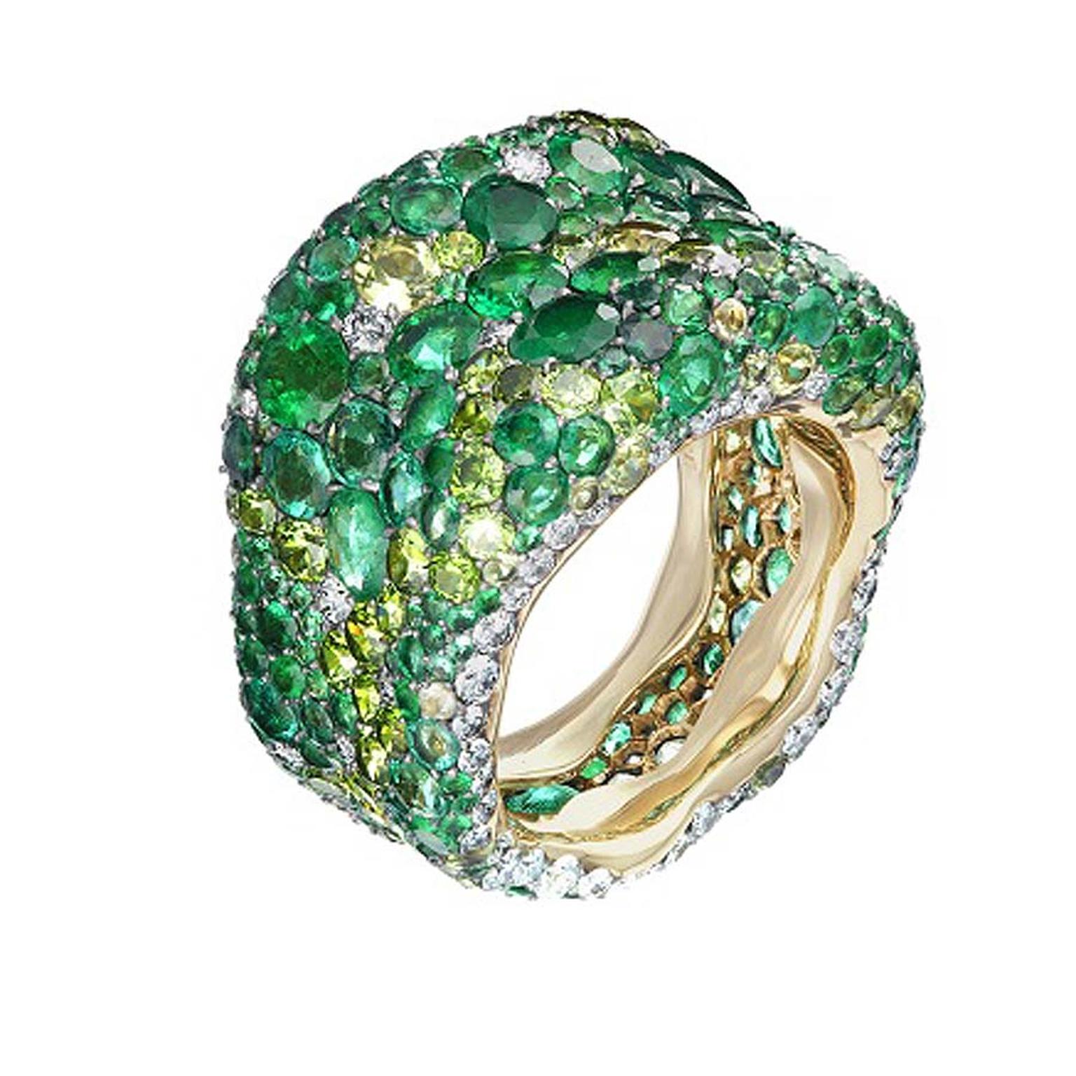 Fabergé Emotion ring pavé set with emeralds and other green coloured gemstones.