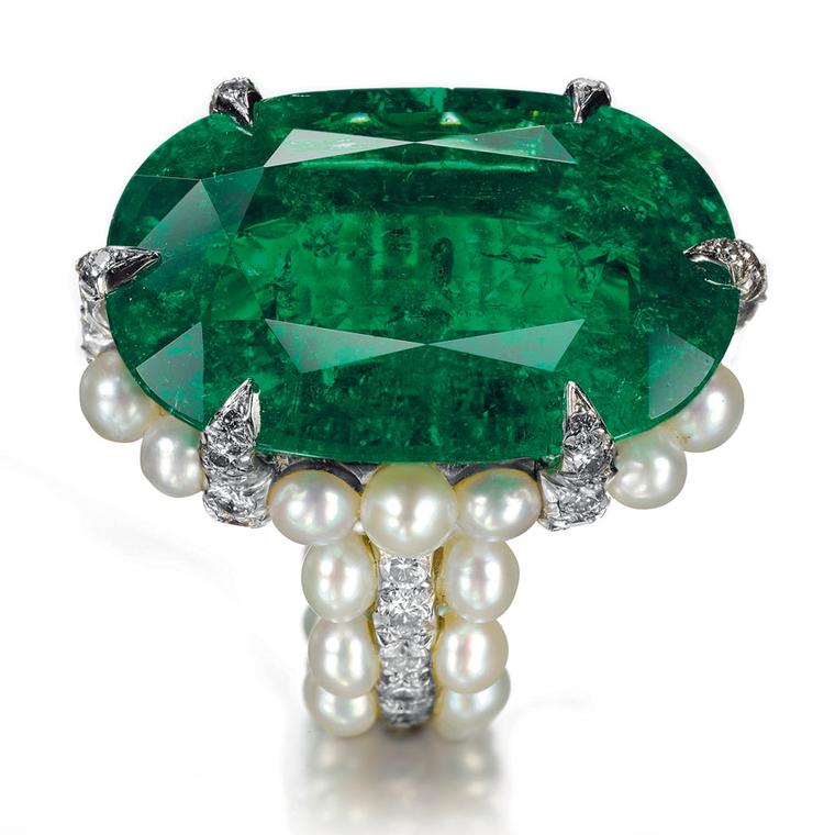 Christies Lily SafraAn-oval-shaped-Colombian-emerald,-natural-pearl-and-diamond-ring