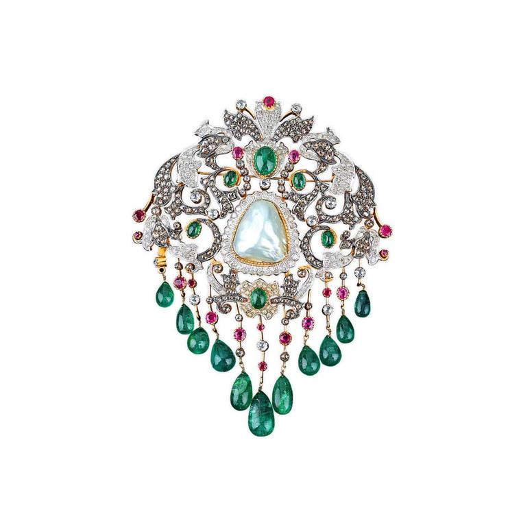 Golecha's vintage-inspired brooch featuring diamonds, rubies and emerald drops set with a large central pearl.