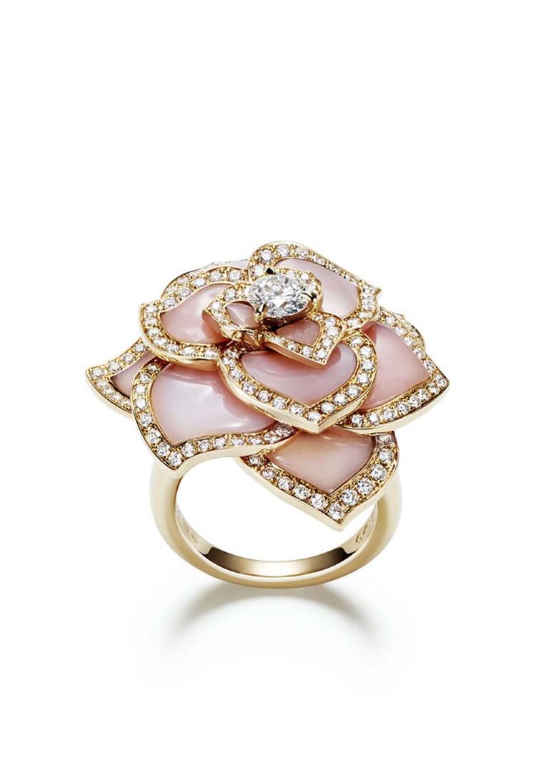 Piaget's pink gold Rose Passion ring features pink carved opal petals set with pavé diamonds and a central brilliant-cut diamond