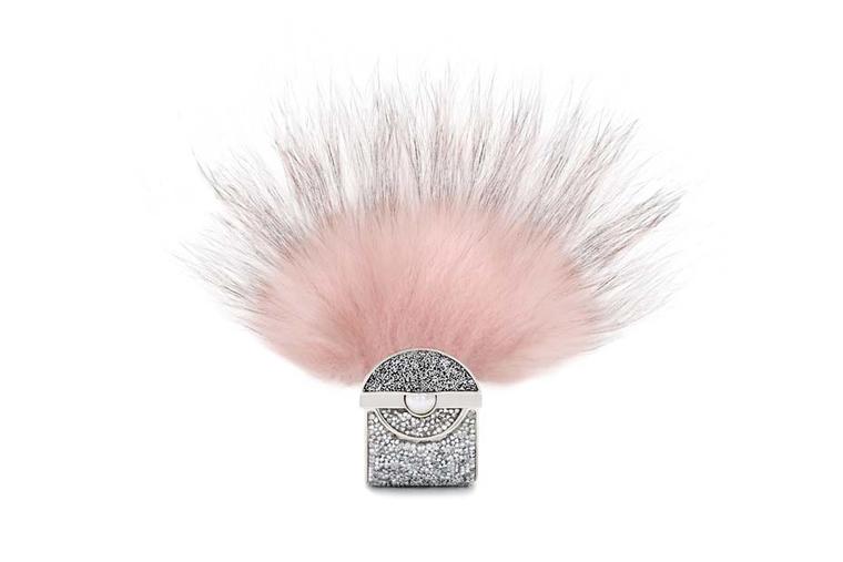 Fur, the iconic symbol of Fendi, was combined with jeweller Delfina Delettrez's signature eye for Fendi Spring/Summer 2014 catwalk show