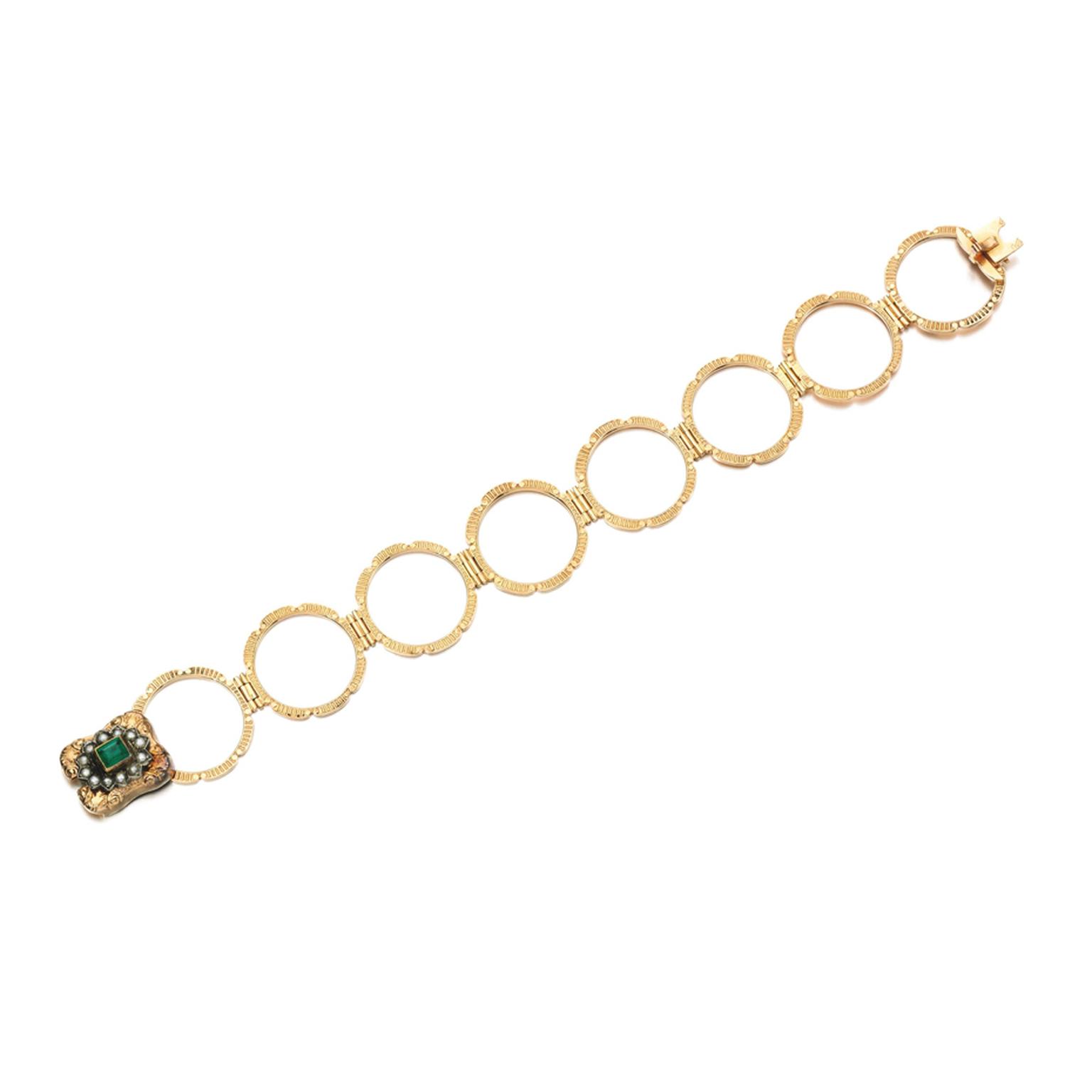 Lot 104, from the Daisy Fellowes collection, a gold, emerald and pearl ring/bracelet (estimate: £3,000-5,000; unsold)