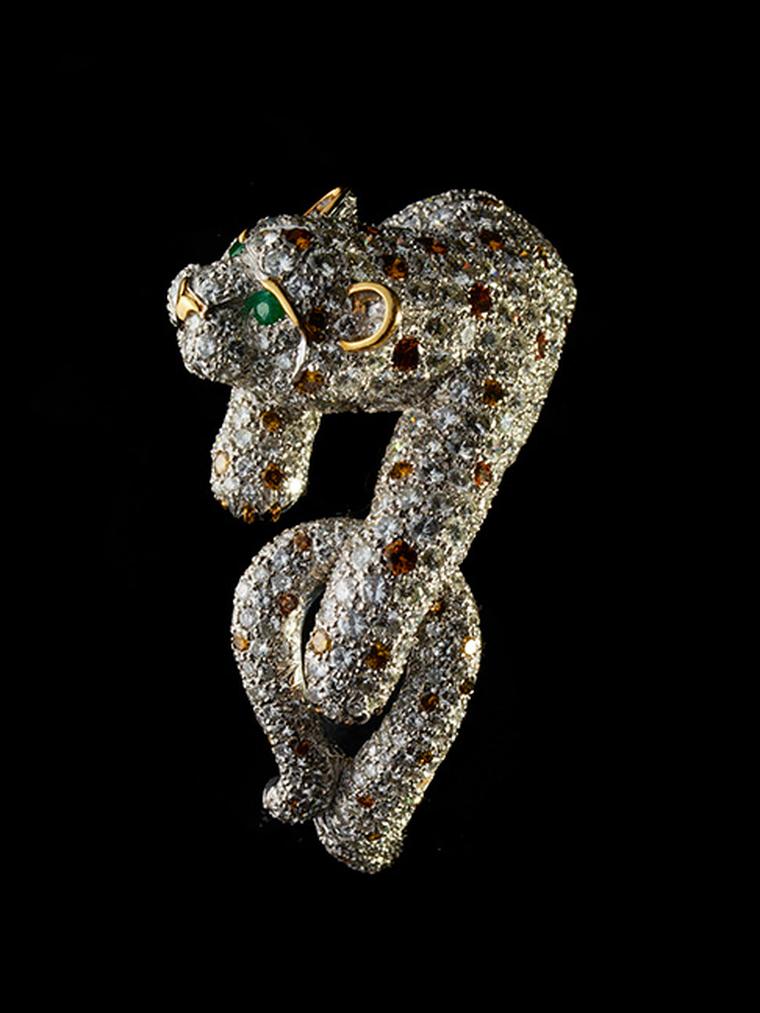 David Webb gold and platinum Panther bracelet featuring cabochon emeralds, rubies and diamonds.