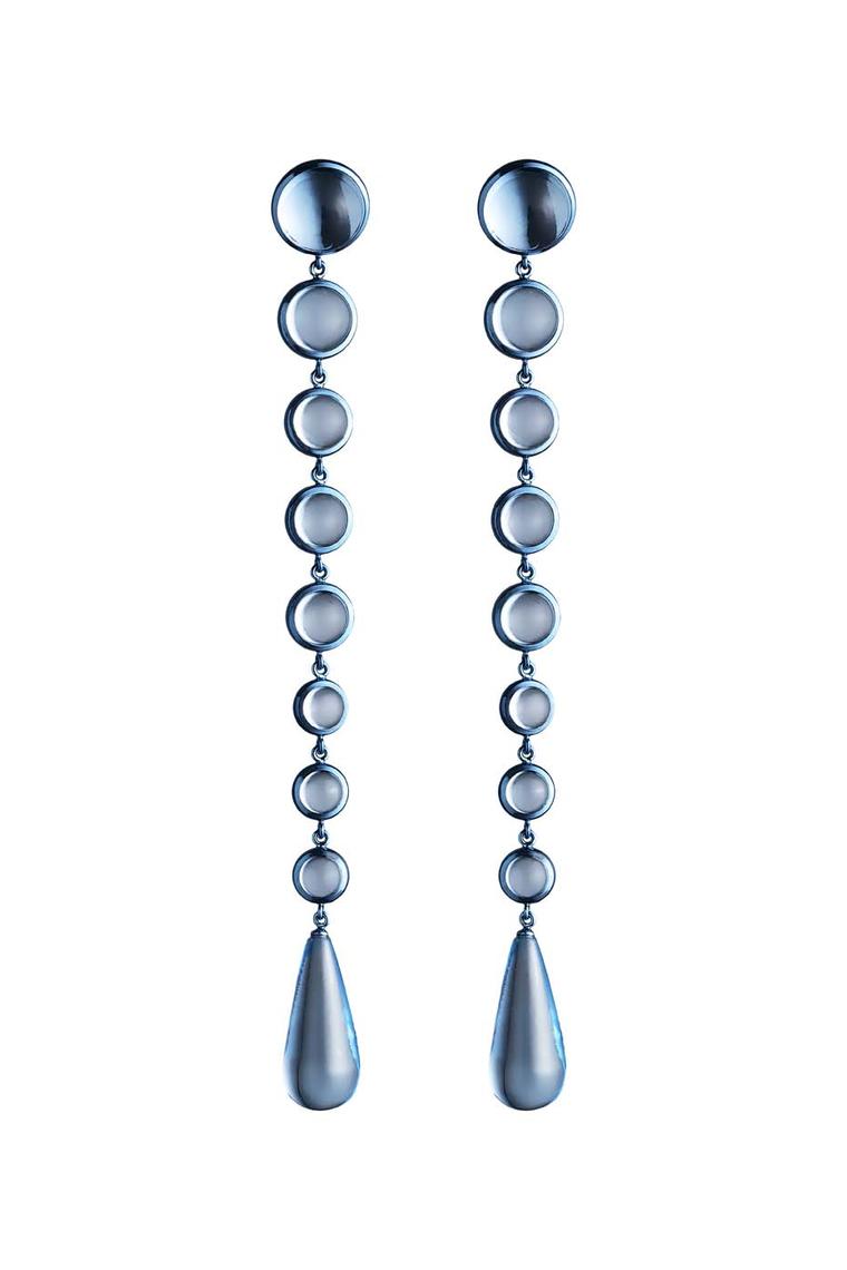 Crafted in an Italian workshop, the Why Not Sky Rain collection earrings featuring blue topaz cabochons and aquamarines briolettes are set in blue titanium with white diamond accents. Edition of five.