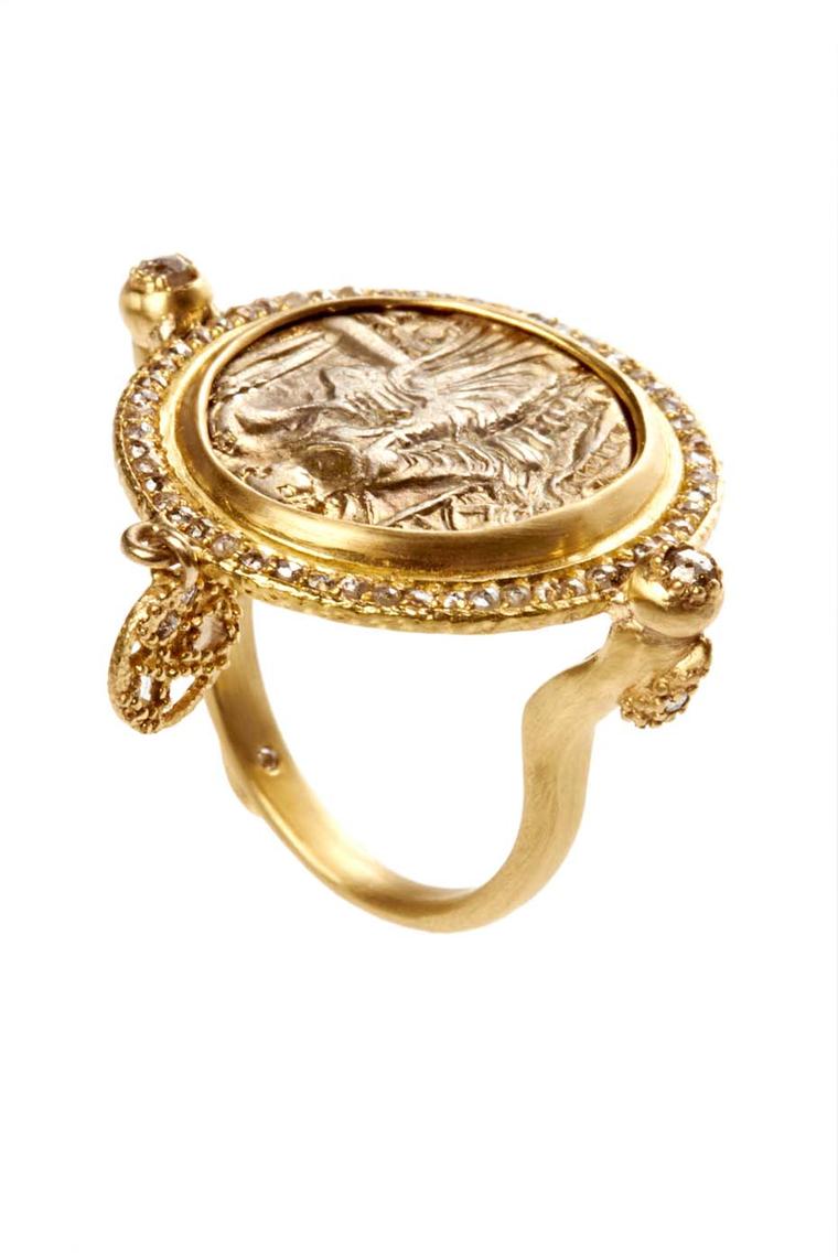 Coomi Antiquity coin ring in gold with diamonds.