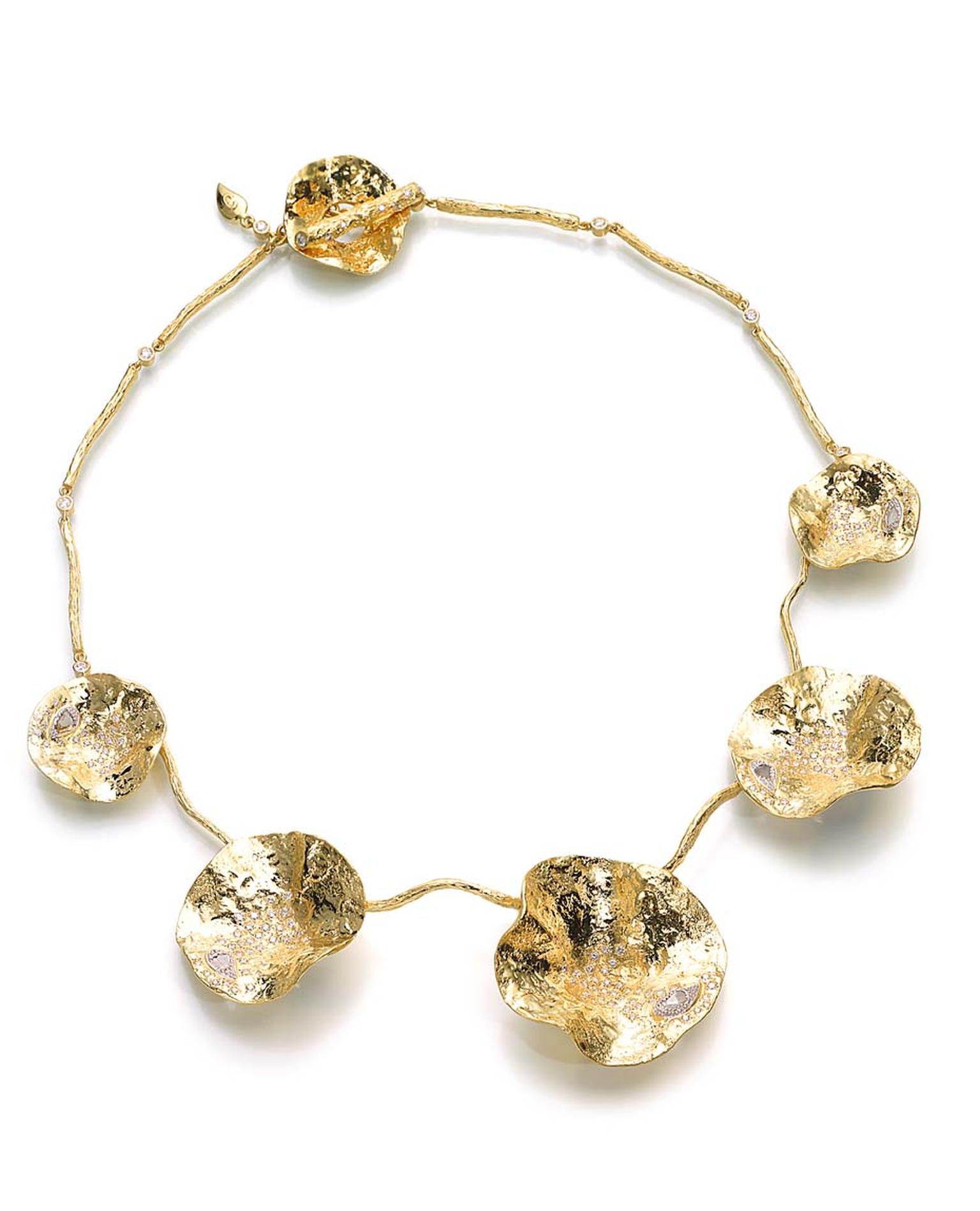 Coomi Serenity Flower bracelet with gold and rose-cut diamonds.