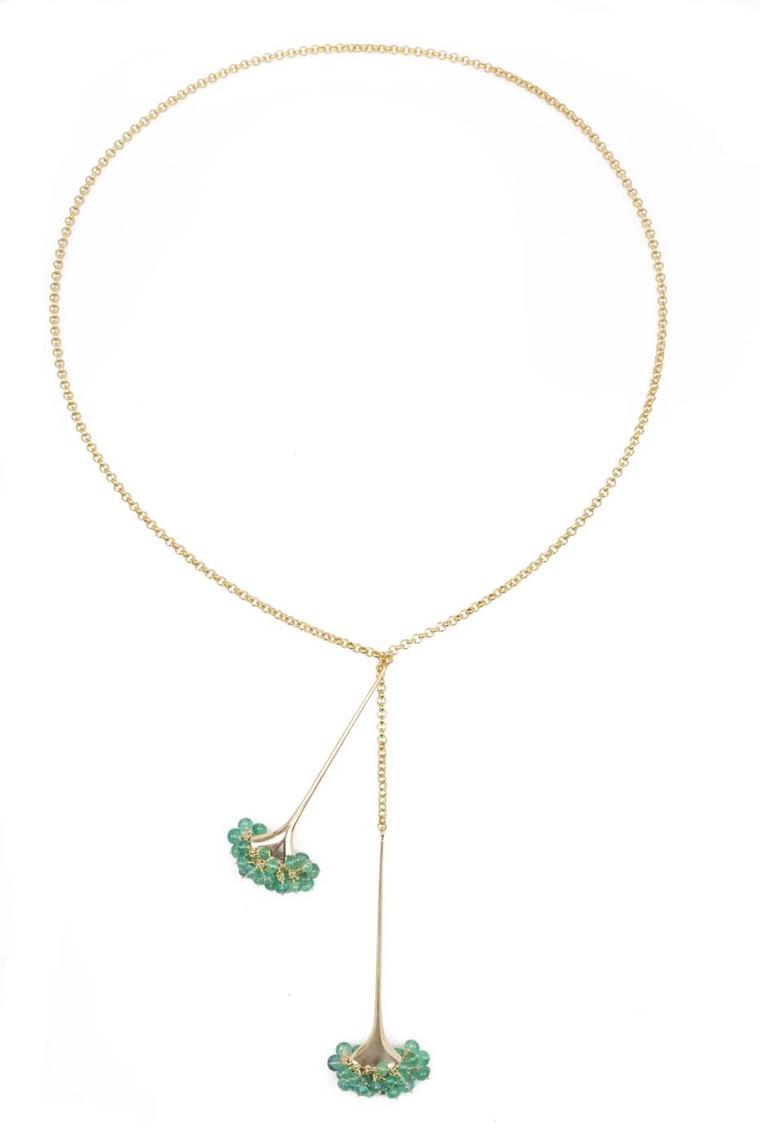 Gurmit Campbell gold Toga necklace featuring emerald beads.
