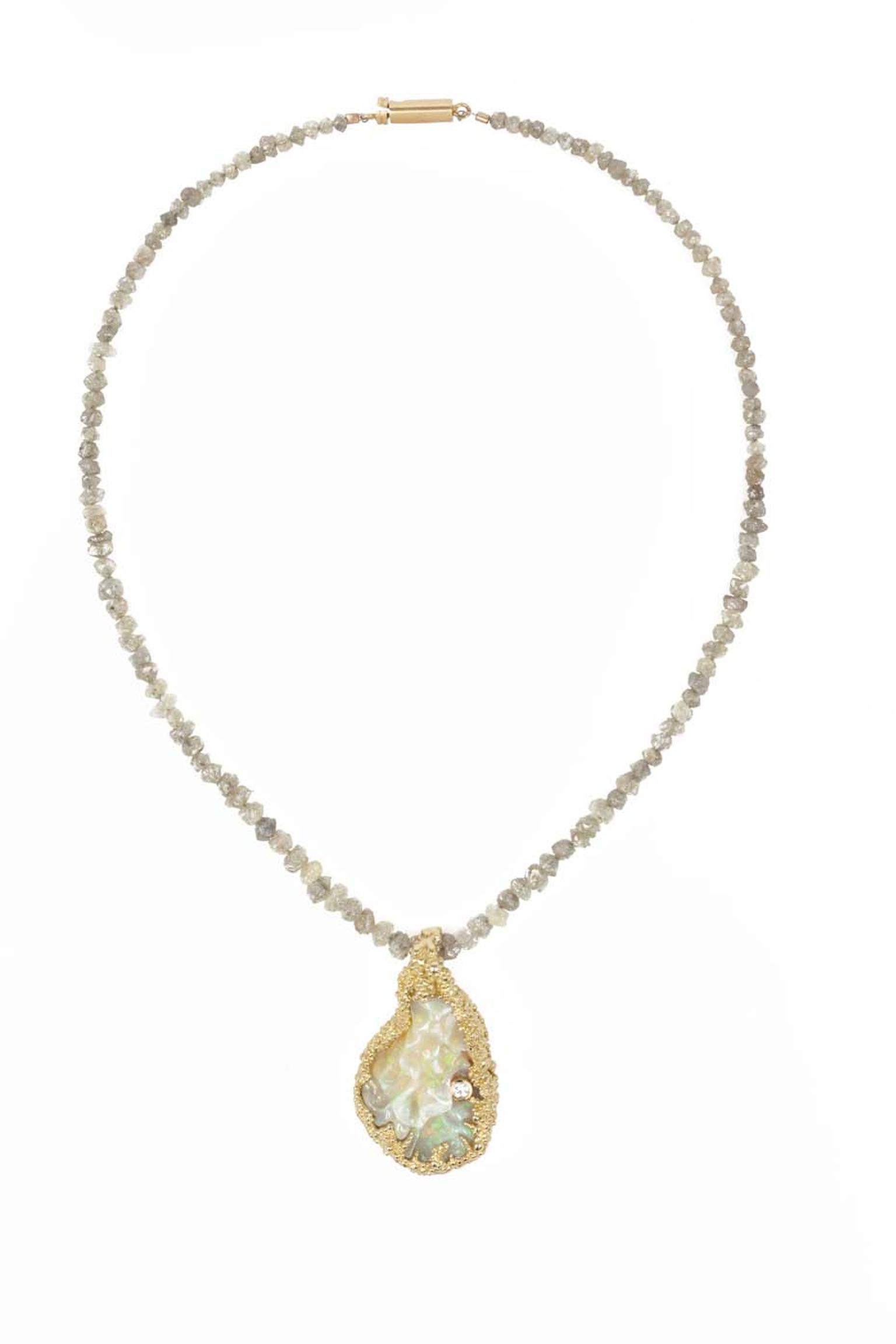 Ornella Iannuzzi Blue Nile Falls necklace featuring a hand-carved Wello opal (20ct) set in gold with a single brilliant-cut diamond.