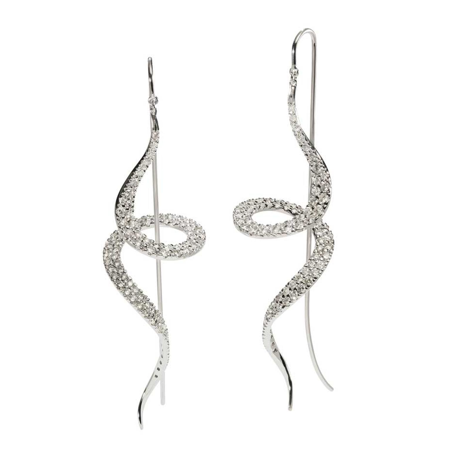 H.Stern's 2014 Oscar Niemeyer collection white gold and diamond earrings display the elegant lines and curves Oscar Niemeyer was so well known for.