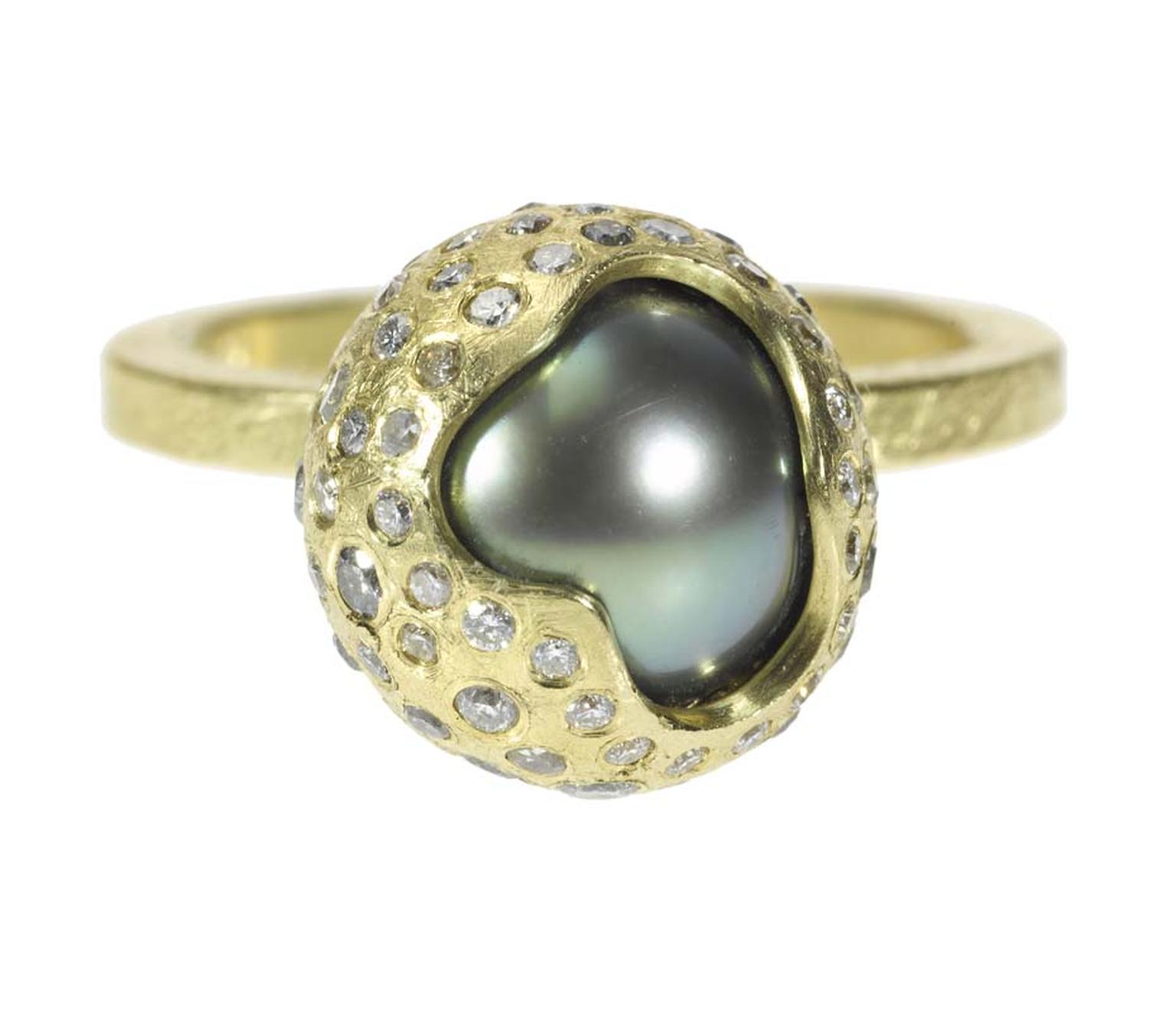 Todd Reed's new pearl collection featuring Tahitian pearl orbs which peek out of diamond-encrusted, textured metal casings.