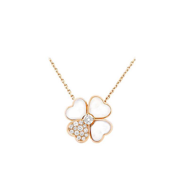 Van Cleef & Arpels Cosmos necklace in rose gold with a brilliant-cut diamond bud surrounded by white mother-of-pearl and diamond petals