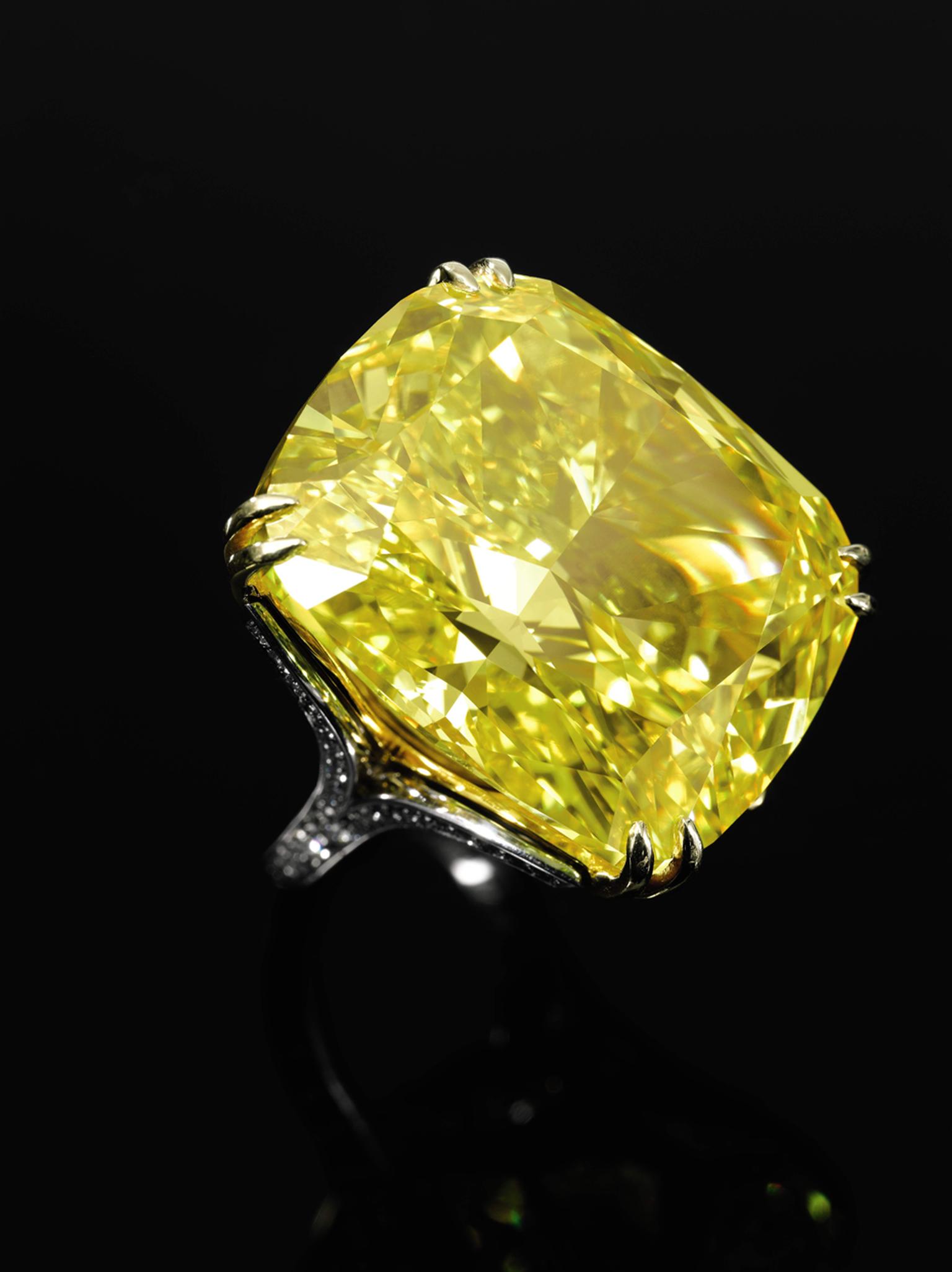 The Graff Vivid Yellow diamond ring is a detachable piece that may also be worn as a pendant. Sold for CHF 14.5million (estimate: CHF 13.4- 22.3million). Image by: Sothebys.
