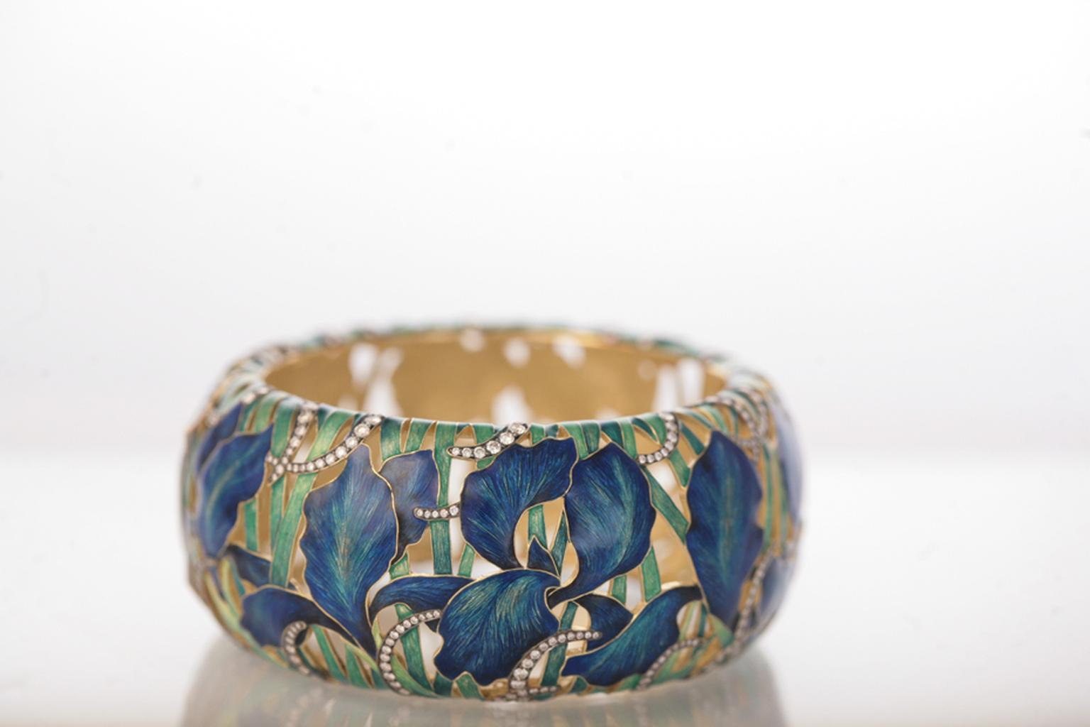Ilgiz F uses grand feu enamelling to recreate the intricacy and vibrant colours of flowers on this bracelet