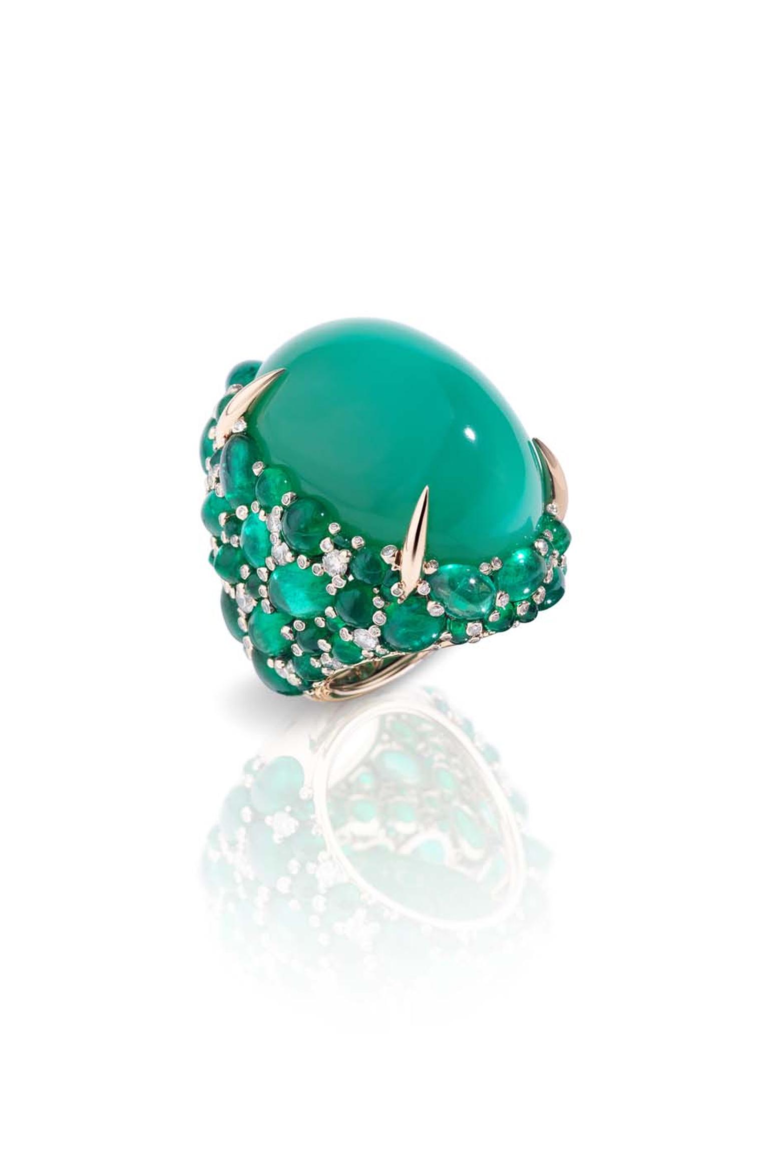 Pomellato Pom Pom griffe ring featuring a green chrysoprase surrounded by cabochon emeralds and diamonds.