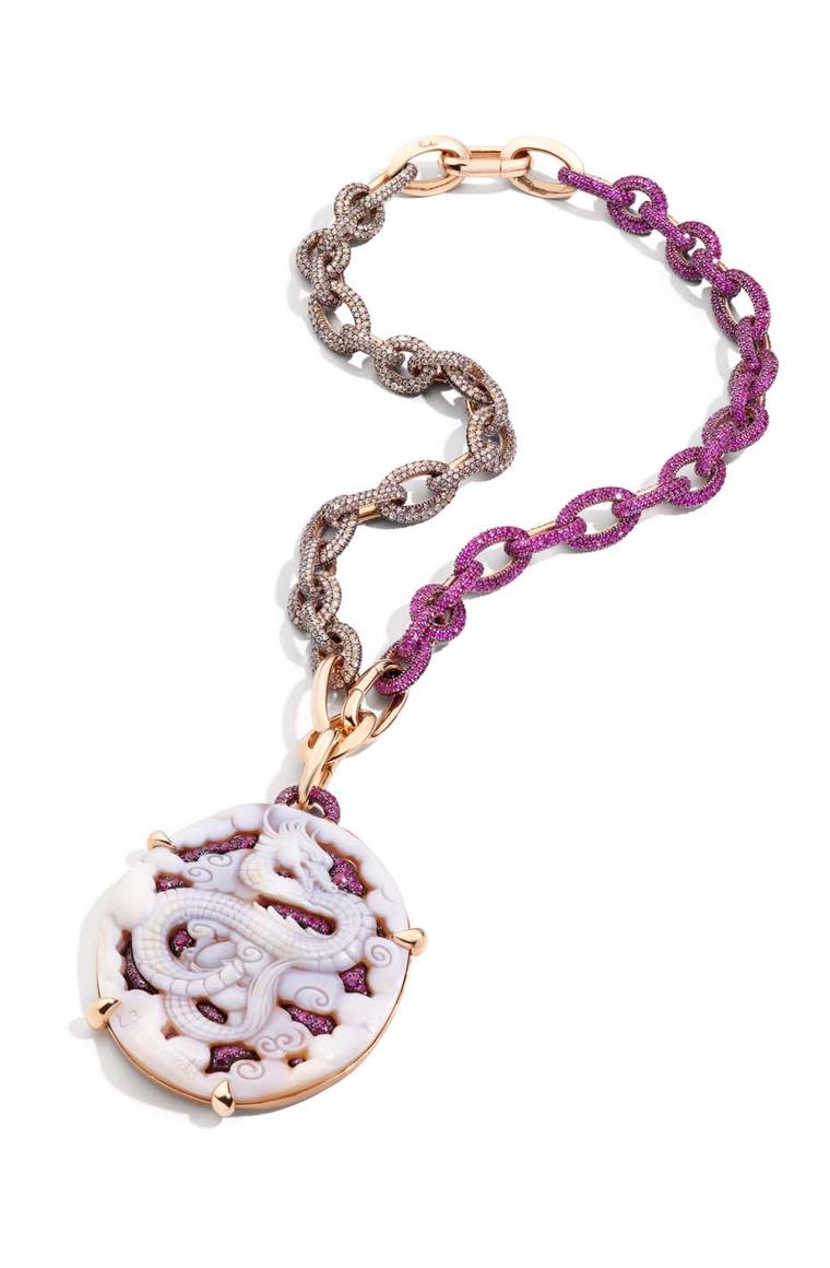 Pomellato Pom Pom Dragon necklace in rose gold featuring a background of rubies mounted in a large openwork cameo.