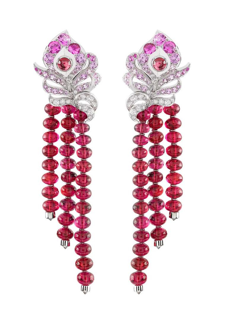 Worn by Emmy Rossum to the 2014 Met Ball, the Van Cleef & Arpels Oiseaux Flamboyant earrings from the 'Birds of Paradise' collection featuring red spinels, pink sapphires and diamonds
