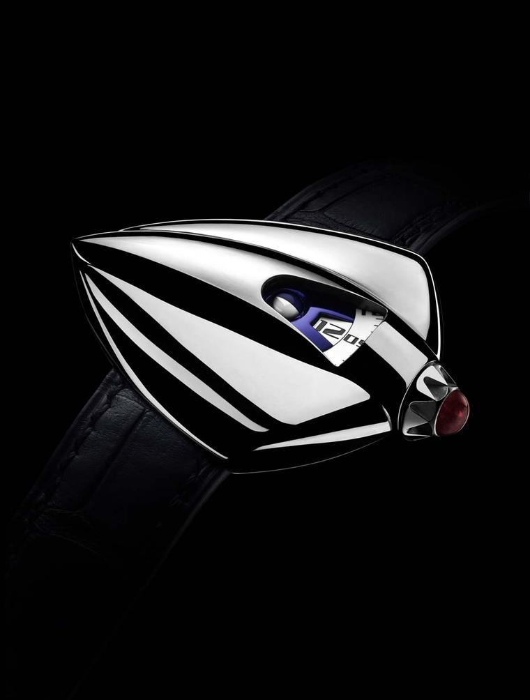 With cambered curves in polished titanium and geometry reminiscent of Art Deco design, the functions of the De Bethune Dream Watch 5 - hours, minutes and Moon phase - are secondary to the sculptural dimension of this 'spaceship' for the wrist